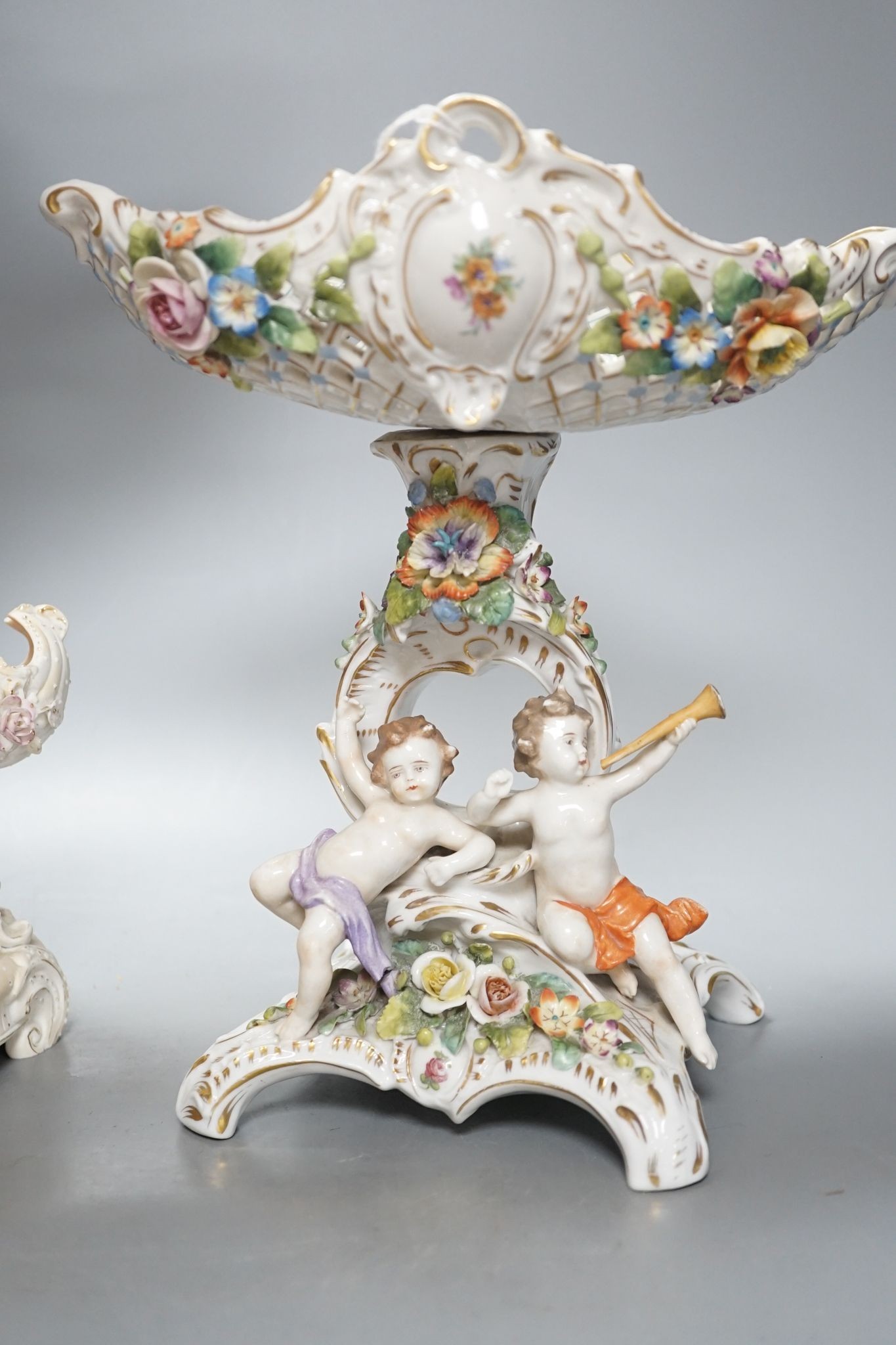 A French bisque centrepiece, Naples porcelain centrepiece and figural chariot, tallest 44cm